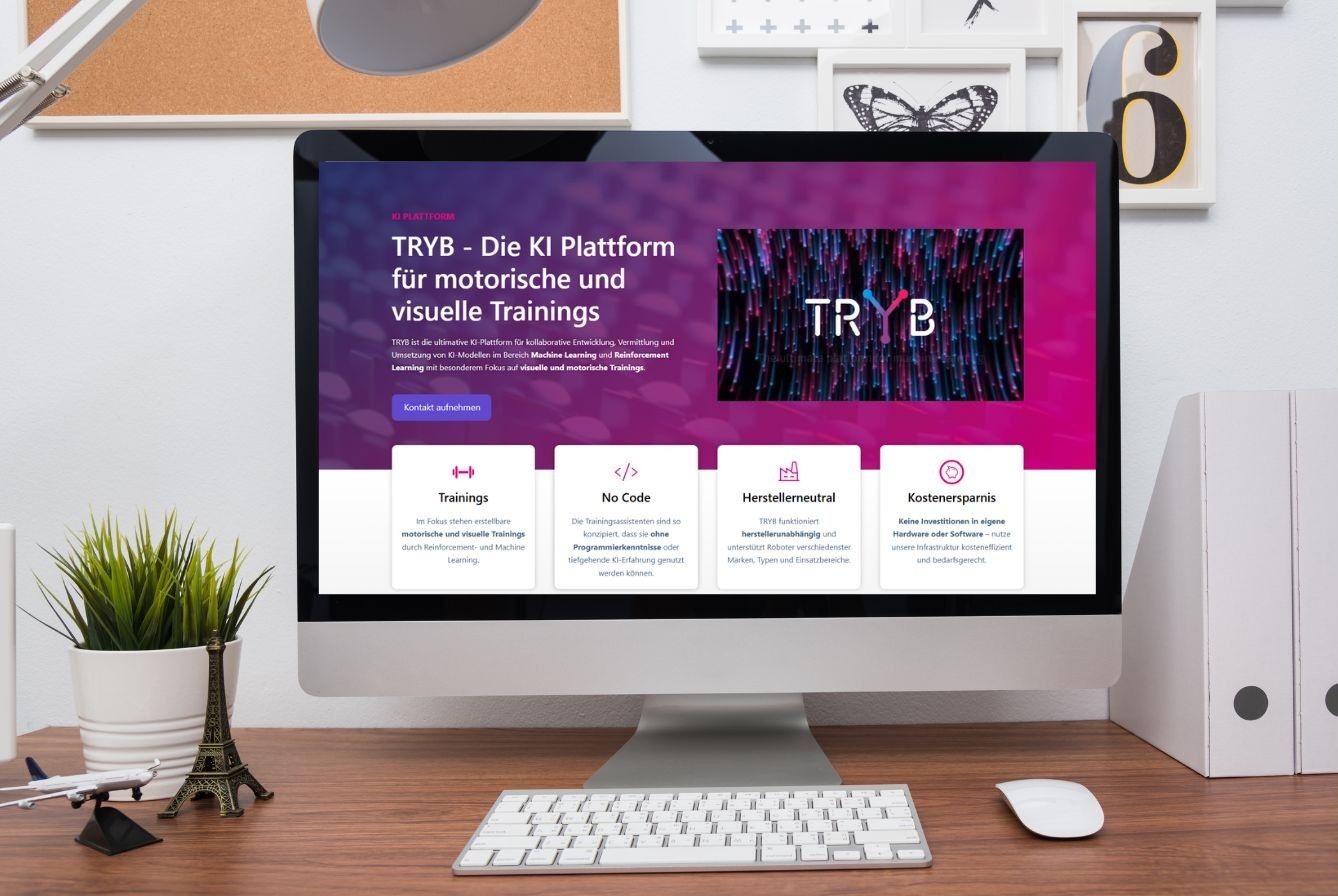 Die TRYB-Website auf einem Desktop-Monitor mit der Überschrift „TRYB – Die KI Plattform für motorische und visuelle Trainings“